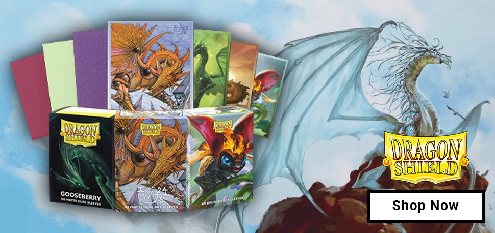 An assortment of Dragon Sheild Cards On one of their white dragon designs